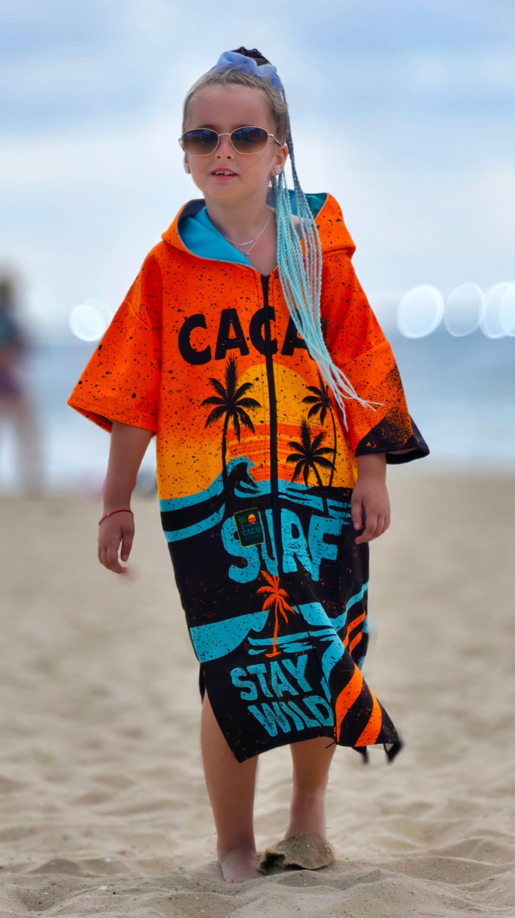 Orange children’s beach poncho towel for girls with hood, zipper and pockets – CACAO Beachwear™