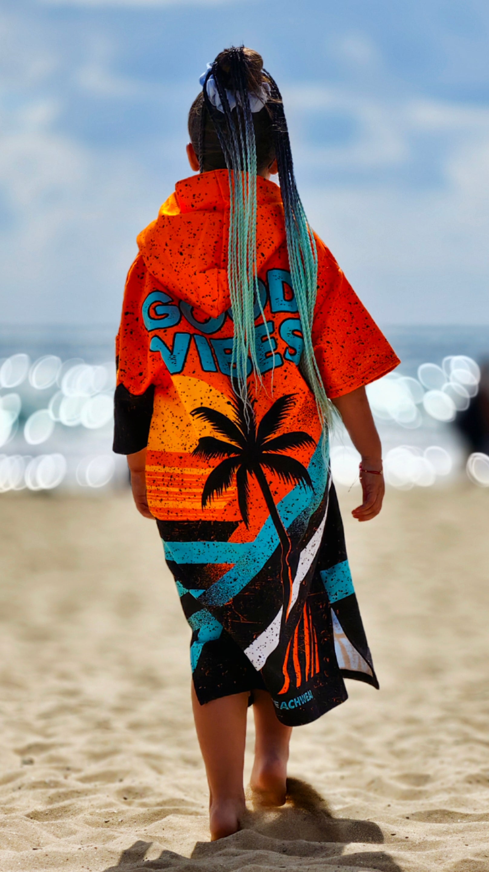 Orange children’s beach poncho towel for girls with hood, zipper and pockets – CACAO Beachwear™