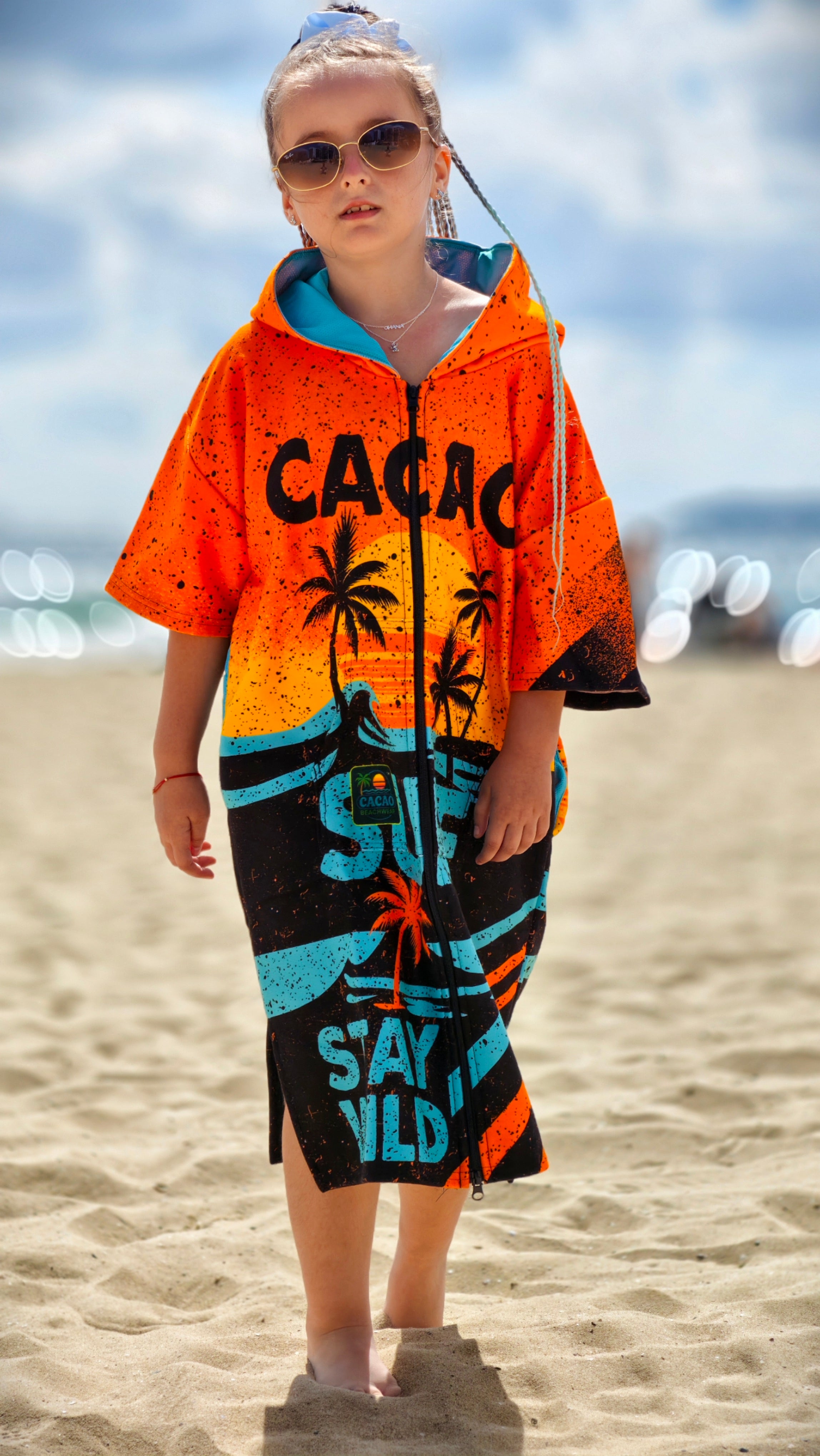 Orange children’s beach poncho towel for girls with hood, zipper and pockets – CACAO Beachwear™